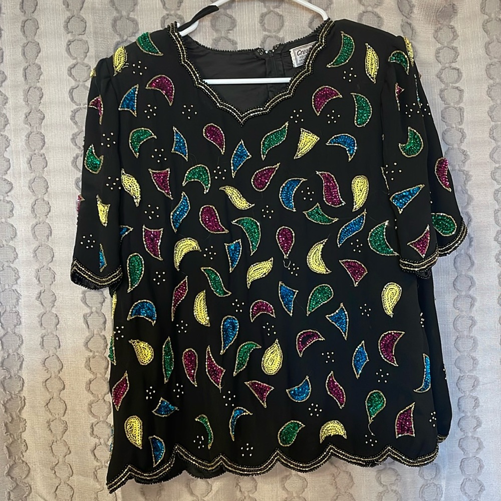 Beautiful beaded shirt, a lot of pretty detail!